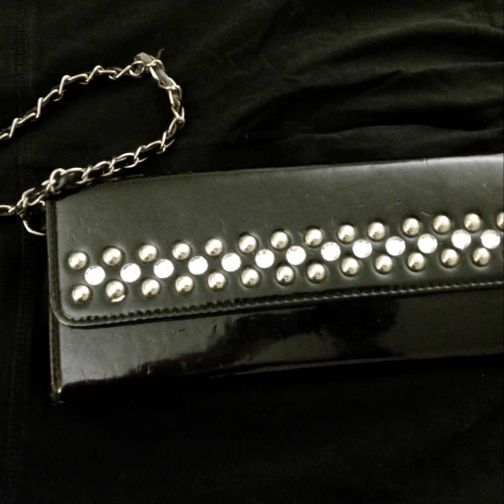 Black clutch with small chain and rhinestones